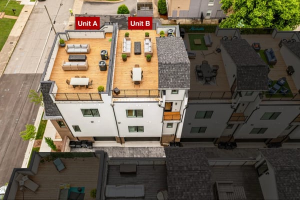 Aerial view of two rooftop terraces labeled Unit A and Unit B with wooden decking, seating areas, and potted plants